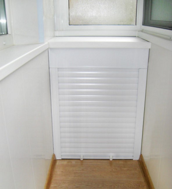 Armoire basse avec volets roulants