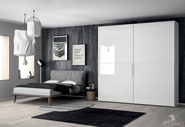 Armoire à deux portes avec façades blanches avec système coulissant coplanaire