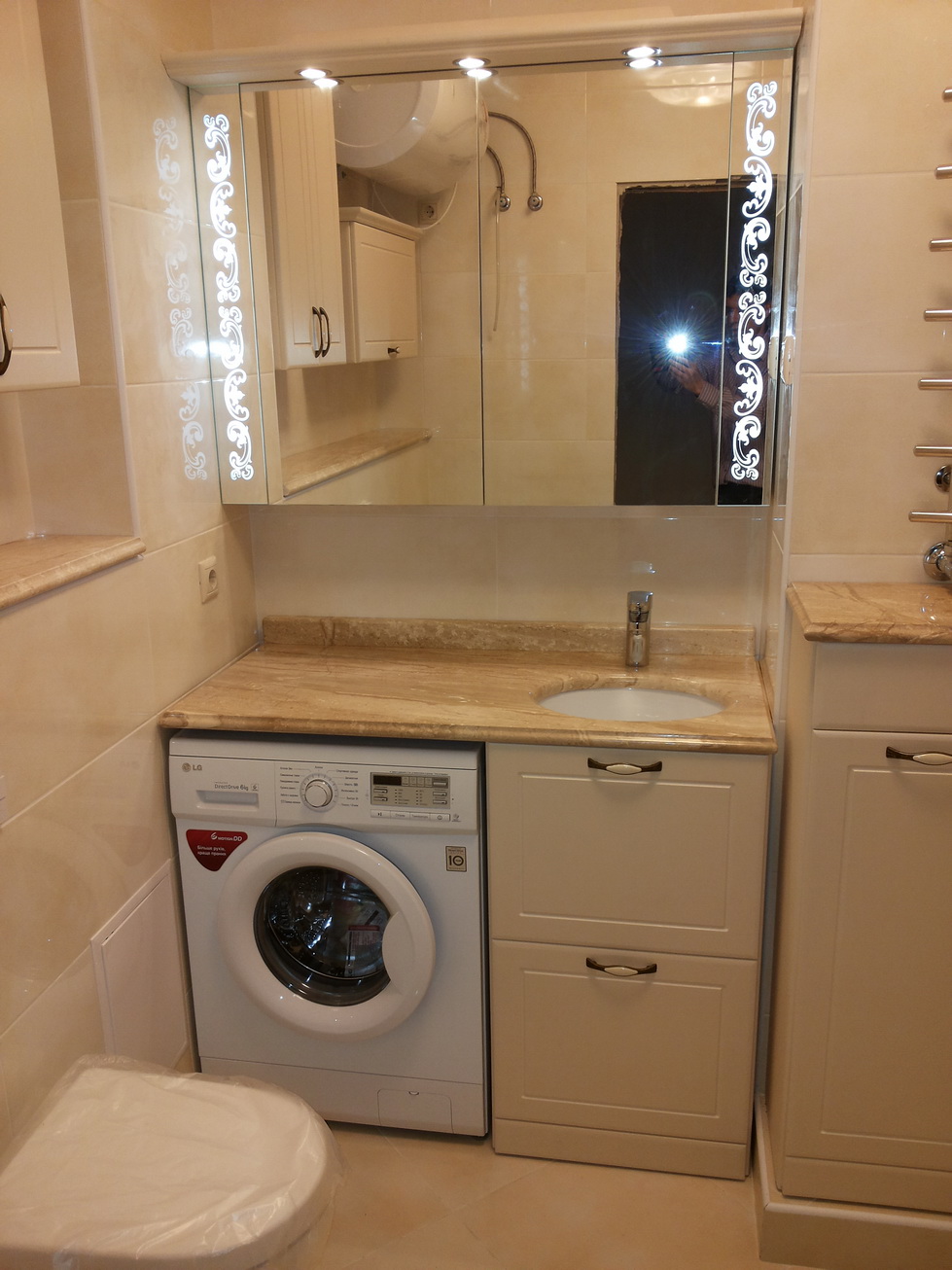 Comment intégrer une machine à laver dans la salle de bain, des idées