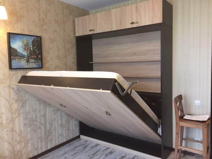 Lit avec éléments d'armoire