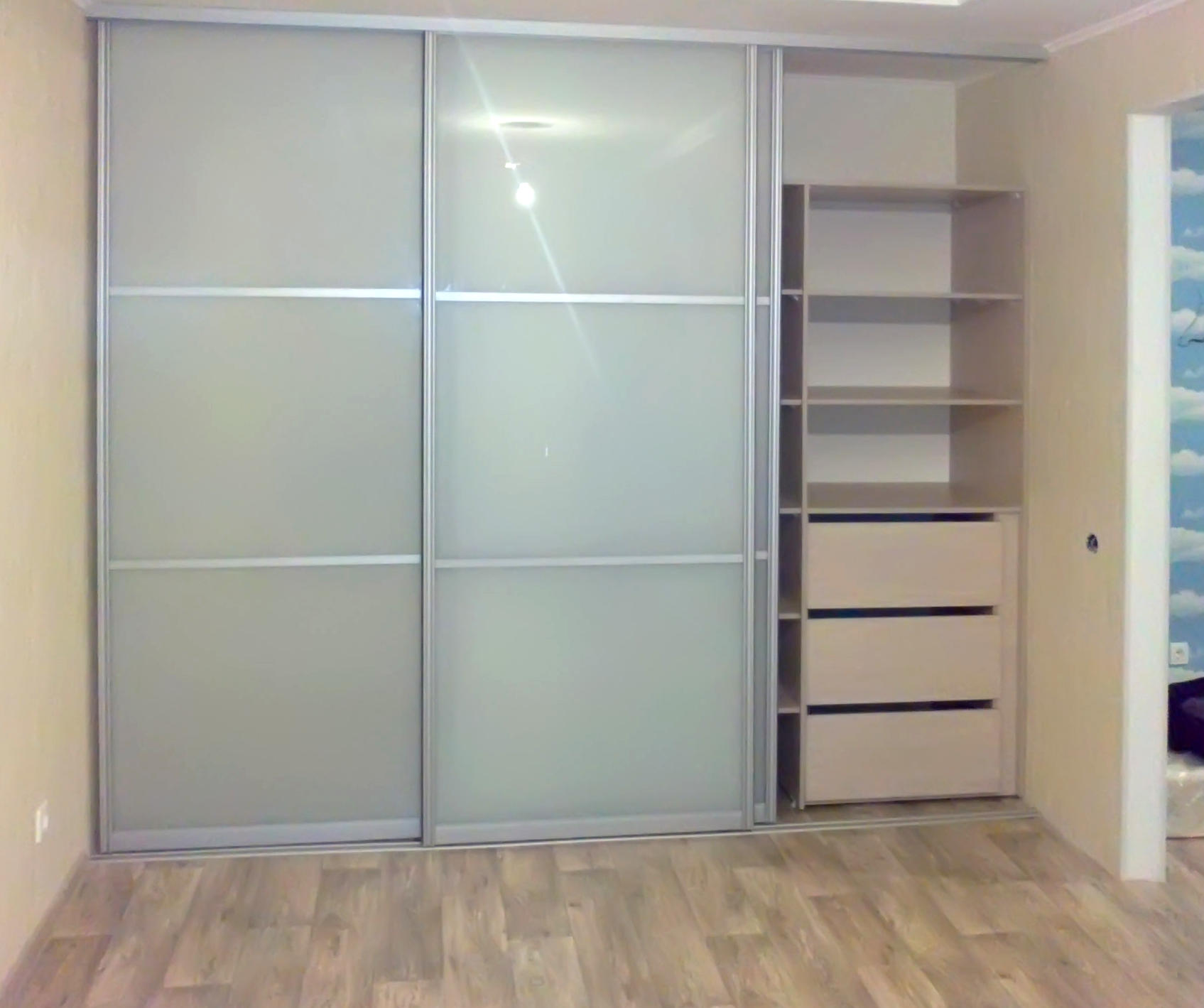 Armoires coulissantes en verre