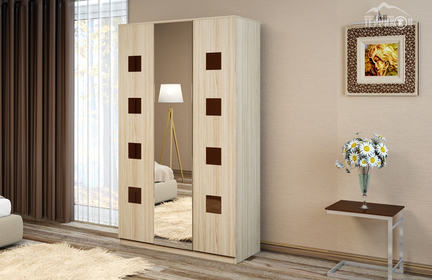 L'armoire s'ouvre par les poignées