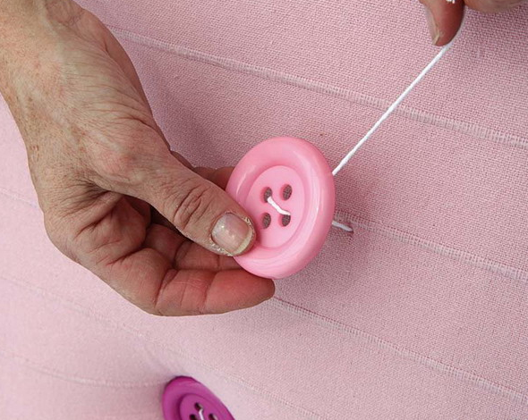 Comment choisir les boutons pour la décoration du lit