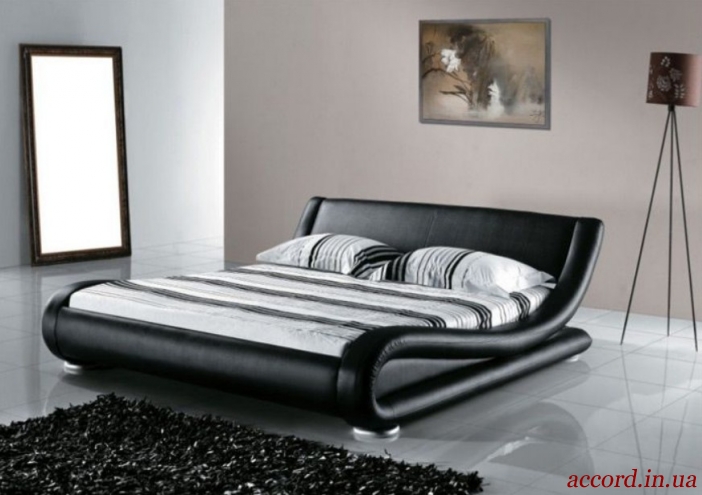 Lits en cuir dans la chambre