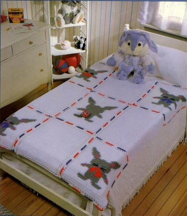 Plaid au crochet pour enfants sur le lit