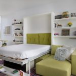 Lit double convertible dans l'appartement